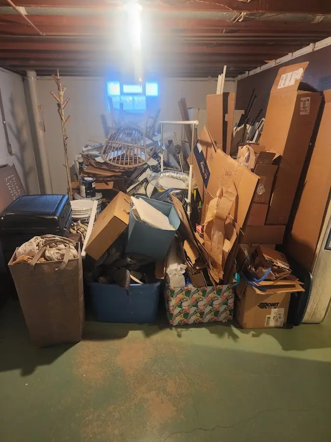 Roll-off dumpster container at job site for 2 Yard Dumpster Rental in Fayetteville